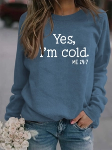 Detail of blue long-sleeve sweatshirt with 'Yes, I'm cold. ME 24:7' print