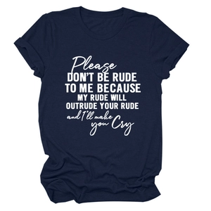 Close-up of Please Don't Be Rude slogan print on a navy blue oversized cotton t-shirt