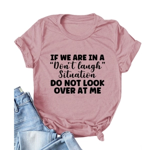 Pink short sleeve cotton T-shirt with black slogan print and classic crew neck