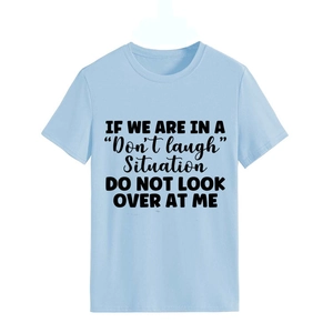 Detail of light blue cotton T-shirt featuring funny black typography quote print
