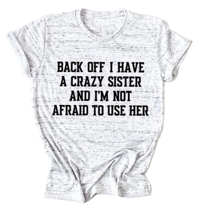 Detail of the crew neck and bold slogan print on the heather grey cotton t-shirt