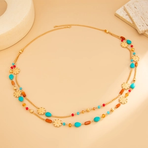 Bohemian multilayer necklace with turquoise beads and gold floral charms on long chain