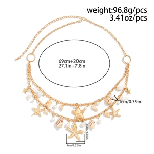 Detailed view of ocean theme layered waist chain with starfish pendants and white pearls