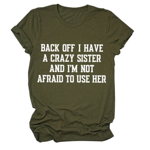 Detail of army green crewneck T-shirt with humorous white text print on white background