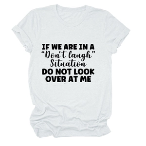 Detailed view of the black letter print on a white casual cotton short sleeve T-shirt