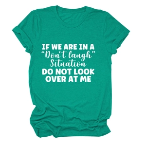 Detail of teal heather cotton t-shirt featuring white humorous text on chest area