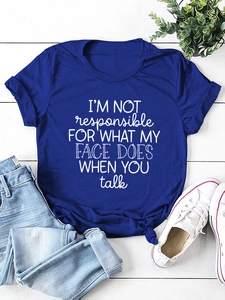 Detail of royal blue slogan T-shirt with stylish side knot and cotton knit texture