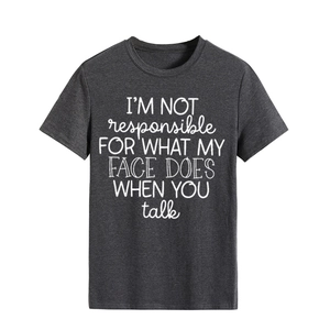 Detail of white slogan print on a charcoal grey cotton crew neck short sleeve t-shirt