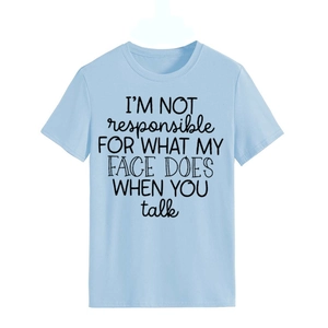 Detail of light blue crew neck T-shirt featuring I'M NOT RESPONSIBLE slogan print