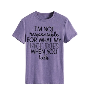 Close-up of heathered purple cotton T-shirt with I'M NOT responsible slogan print