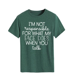 Detail of dark green cotton T-shirt featuring 'I'm not responsible' slogan print