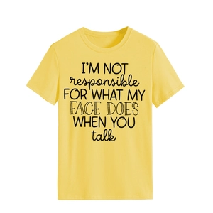 Detail of yellow cotton T-shirt featuring black 'I'm not responsible' humor slogan print