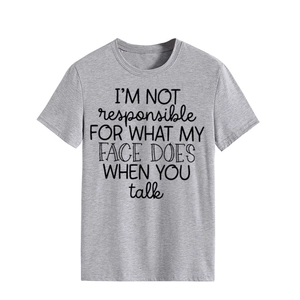 Close-up of grey crew neck T-shirt featuring I'm Not Responsible text print detail