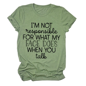 Detail of I'm Not Responsible slogan print on bean green cotton short sleeve t-shirt