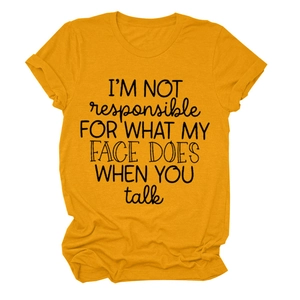 Detail of rolled sleeve cuffs on mustard yellow cotton T-shirt with funny quote print