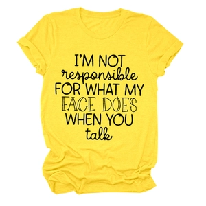 Close-up of funny slogan print on yellow cotton crew neck t-shirt for women