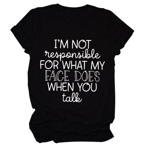 Close-up of I'm Not Responsible slogan print on a black crew neck cotton T-shirt