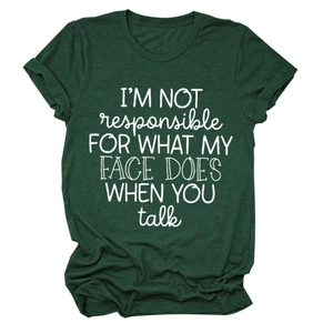 Detail of white slogan print on a dark green crew neck short sleeve cotton T-shirt