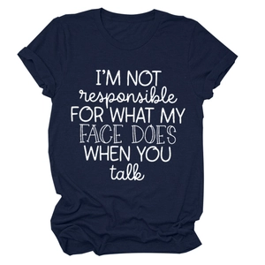 Detail of navy cotton T-shirt featuring 'I'M NOT responsible' white text print