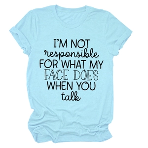 Detail of light blue cotton T-shirt featuring funny black typography slogan on the chest