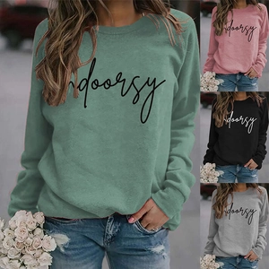 Detail view of cotton crewneck sweatshirt available in green, pink, black and grey
