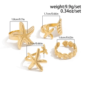 Detailed size chart for 4-piece gold ocean ring set featuring starfish and shell charms