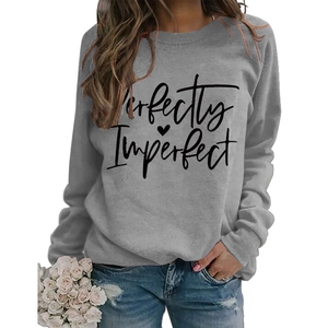 Close-up of Perfectly Imperfect slogan print on grey crewneck long sleeve sweatshirt