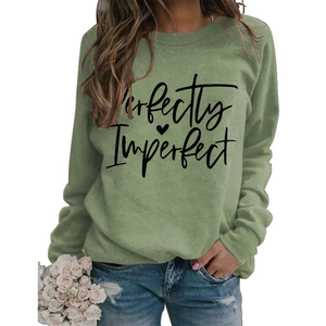 Sage green crewneck sweatshirt featuring Perfectly Imperfect print with heart logo