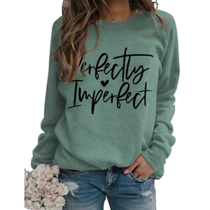 Detail of Perfectly Imperfect slogan print on sage green long sleeve sweatshirt