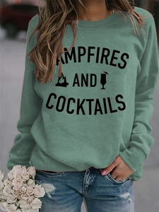 Detail of grey-green sweatshirt with Campfires and Cocktails print and ribbed cuffs