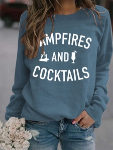 Detail of the CAMPFIRES AND COCKTAILS graphic print on this Morandi blue women's sweatshirt