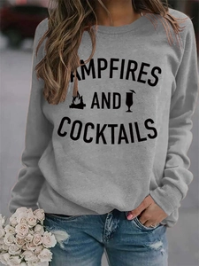 Macro view of Campfires and Cocktails letter print on grey long sleeve crewneck sweatshirt