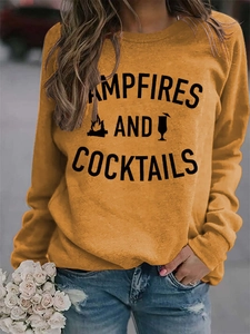 Detail of campfire and cocktails print on a ginger long sleeve crewneck sweatshirt
