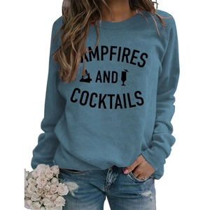 Detail of blue long-sleeve sweatshirt with black CAMPFIRES AND COCKTAILS letter print