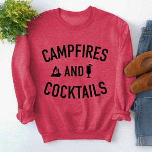 Detail of red crewneck sweatshirt with Campfires and Cocktails letter print and graphics