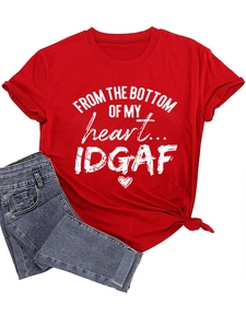 Close-up of red cotton t-shirt with white vintage lettering and stylish side-knot