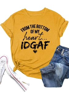 Flat lay of yellow crew neck t-shirt with FROM THE BOTTOM print and denim jeans