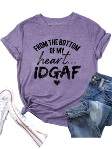 Flat lay of purple short sleeve t-shirt with heart graphic and side knot detail