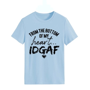 Detail of light blue cotton T-shirt featuring a black graphic heart and slogan print