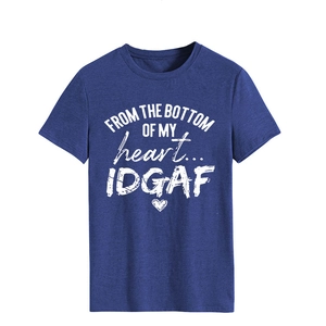 Detail of navy blue cotton T-shirt featuring white artistic script print and heart pattern