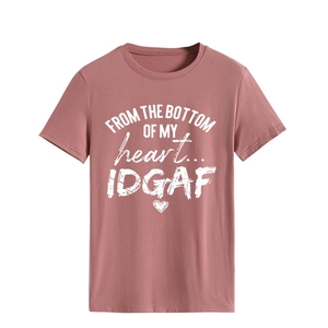 Close-up of the cotton T-shirt featuring a white heart graphic and artistic printed slogan