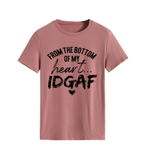Close-up of crewneck t-shirt in dusty rose with black heart and slogan print design
