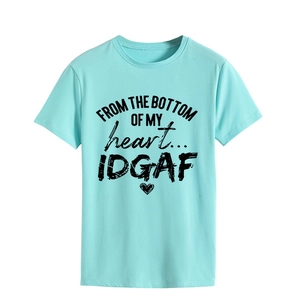 Detailed view of the mint green cotton t-shirt with black artistic letter print