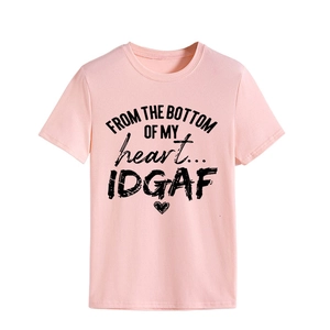 Detail view of pink crew neck cotton t-shirt featuring black FROM THE BOTTOM printed slogan