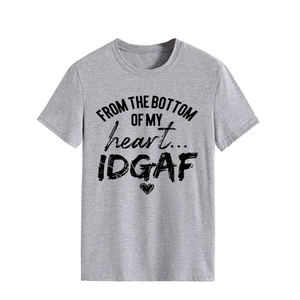 Close-up of grey crewneck T-shirt with black graphic text and heart print detail