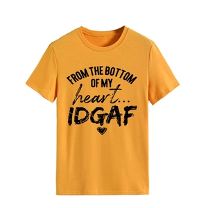 Detail of soft cotton yellow t-shirt featuring black FROM THE BOTTOM typography