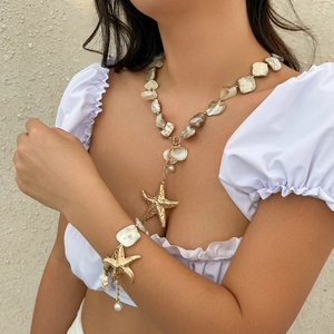 Bohemian beaded necklace and bracelet set with shell pearls and golden starfish pendant