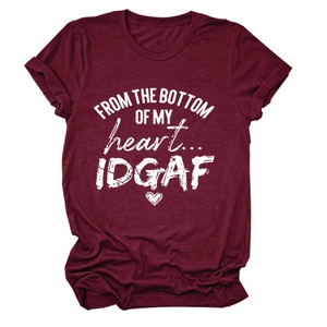 Detail of burgundy cotton t-shirt featuring white artistic text and heart print