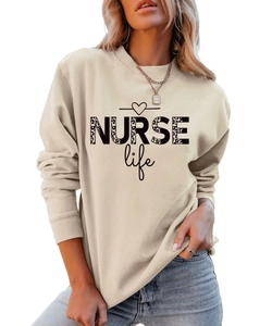 Close-up of NURSE life leopard print text on beige crewneck sweatshirt for women