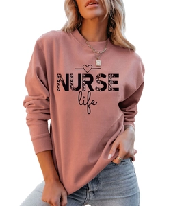Detail of NURSE life leopard print on a dusty rose crewneck sweatshirt for women